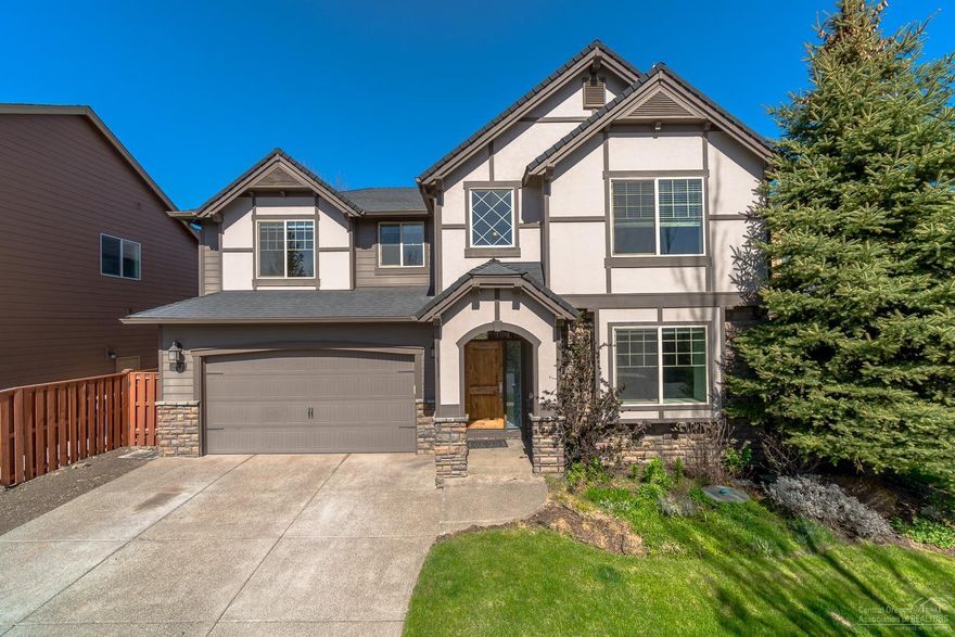 Enjoy the pool & clubhouse this summer in NE Bend's Lava Ridges. Charming 4 br, 2.5 bath home w/dramatic 2 story tall great room that looks out to a lg back yard & the canal thru a wall of windows. Kitchen is open to the Great Room & Dining, Gas range, tile counters w/bar seating & a corner pantry. Main level guest Suite, Spacious Master Ste upstairs along w/ additional Bonus Room! Master offers a soaking tub, walk in shower & closet w/plenty of storage. Great architectural details throughout w/arched entries, coffered tray ceilings, art niches, office space & built in entertainment center surrounding the gas burning fireplace. Mature landscaping w/decorative pergola, paver patio w/space to entertain. Cascade Mtn Views from the Bonus & Master! Gas forced air furnace & A/C. Triple car garage & space for all your toys too.