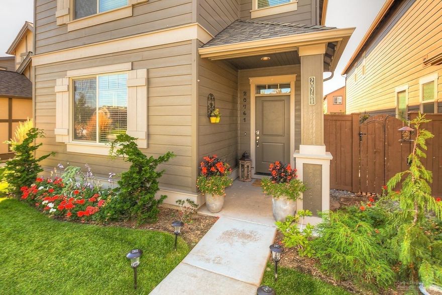 Love at first sight, 3 years new, stylish nest. This quality built Pahlisch Home is on the quietest street in McCall Landing directly across from Boyd Park ~ the quiet side. Former model benefits from upgrades ~ master closet w/wood shelving, stone fireplace,++. Large Loft upstairs for 2nd gathering space. Lush landscaping in the private side yard retreat beckons you outdoors. Smart, fresh finishes - quartz countertops throughout, knotty alder cabinets, undermount sinks. Carefully maintained, turn key.