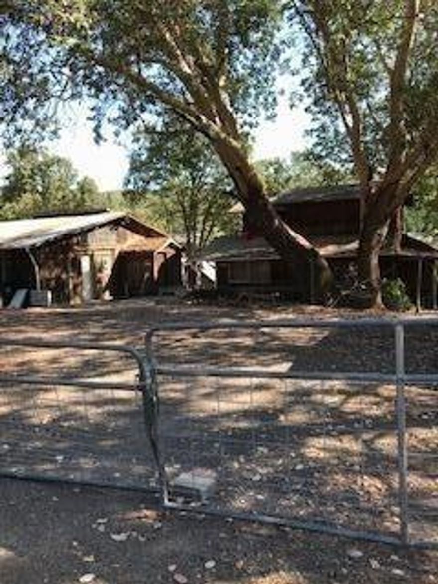 Location, Location, Location!! Formerly a local antique store this property has endless possibilities. Needs tender, loving, care throughout, but with a little can-do attitude and some elbow grease you can make this diamond in the rough shine once again! This property features 1 bedrooms, 1 half bathroom (2nd bathroom in the works), 1152 sq ft, multiple outbuildings, 1.13 acres, and potential throughout! Cash only sale due to condition! Seller financing available!