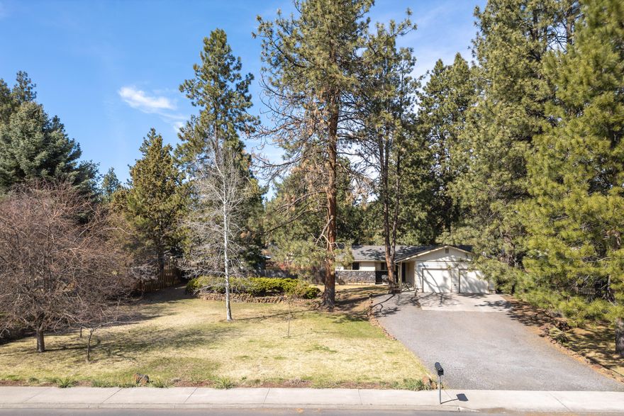 Welcome to this beautiful single-story ranch home, offering 3 bedrooms and 2 full bathrooms, perfectly situated on a spacious .44-acre lot. This charming property boasts a welcoming entryway and a fantastic floor plan that seamlessly flows from the kitchen to the dining and living areas. The kitchen features stainless steel appliances and sink, a pantry, and a convenient breakfast bar. The cozy living room is enhanced by a charming pellet stove, and french doors open to the back patio, offering the ideal space for indoor-outdoor living. Throughout the home, you'll find lovely wood floors and tile, as well as ductless mini splits for year-round comfort. The private fully fenced backyard is an entertainer's paradise with a large patio, raised garden beds, and plenty of space for relaxation or play. The property also includes a detached shed/garage with lean-to covered parking for added convenience. This well-maintained gem is ready to welcome its next owners. Close to Brookswood Plaza!