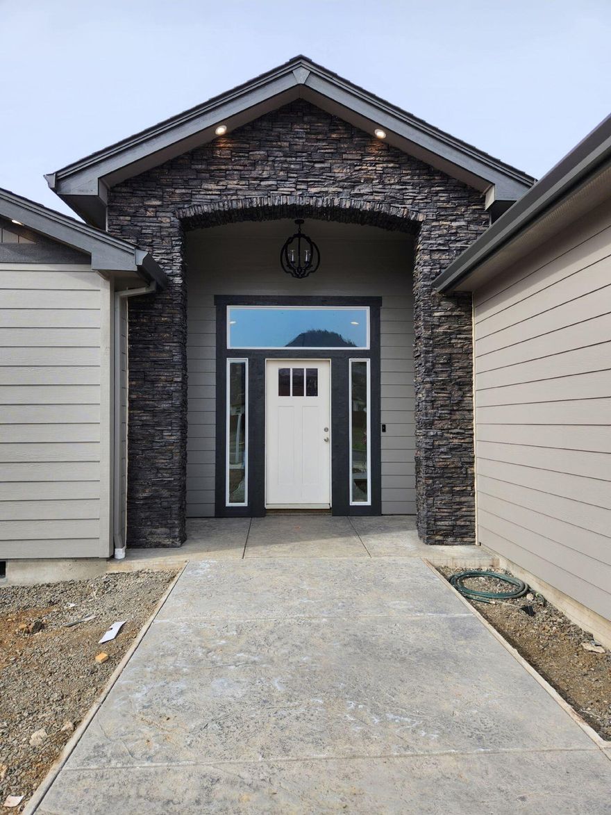 This spacious 2474 sq ft, 4 bed 3 bath features 2 master suites, tile bathrooms, hickory & maple custom cabinets with farmhouse sink, vaulted ceiling with beams, good sized pantry, large tiled laundry room with tons of storage, grand foyer entrance, fireplace with built-ins, and an ample back yard! Gorgeous stamped concrete in the front and back. This home is thoughtfully laid out, custom designed & built with strict attention to detail by Southridge Builders LLC. Built on an approx 0.20-acre lot in the highly sought-after Cedar Landing Neighborhood. The rear master features a fully tiled walk-in shower with glass surround, a stand alone bathtub, and dual sinks. Appliances included: oven with range, microwave over wall oven, and dishwasher. *The interior is expected to be completed mid March 2023. The landscaping & fence by end of March 2023. *Builder to allow $10,000 for closing costs or rate buy down.