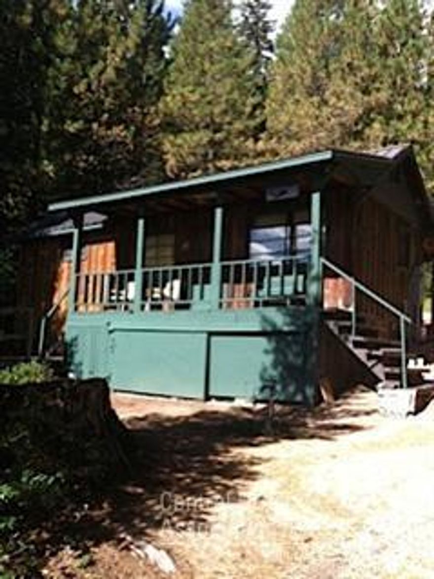 Great small cabin on Crescent Lake shows like a doll house. This cabin has a storage shed a dock a new well and a new septic system. Plus a vaulted septic. Plans for additional bedroom may be available. Great location on the lake with deep water in front of the cabin. There is a fire pit and great lake vies from the home, deck and covered porch