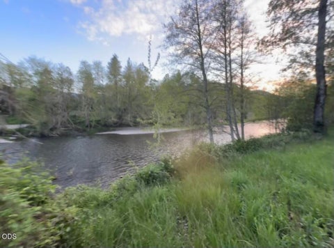 Photo of 1570 Sleepy Hollow Loop, Grants Pass, OR 97527 (MLS # 220228845)