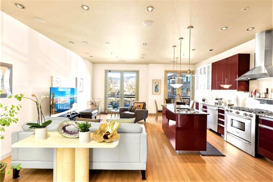 Award-Winning  ''Best New Building in the Downtown Historic District 2009'', designed by SERA Architects of Portland. The beautiful interior is bathed in natural light from walls of windows featuring majestic mountain views. Gleaming glass, stainless, stone & hardwood create a sophisticated style with smooth lines & functional form. The main living area is open-concept with multiple seating areas. The chef's kitchen with large granite island & dining bar, gas range w/ stainless hood & the dining area, all have spectacular vistas. Separate den or office & half bath complete the main level. Stairway with stainless railings leads to 2 beautiful suites. Primary features luxurious bath, soaking tub, upscale shower & walk-in. Upper-level 500 SF rooftop patio with panoramic vistas, fully plumbed for outdoor kitchen. Additional spacious balcony with afternoon sun & sunset views. Underground parking available - $241 month, paid annually. Zoning allows for hotel status with city/health license.