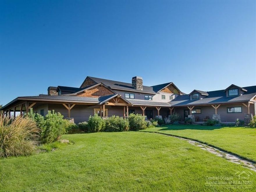 Productive land, stunning home and high-quality barn and indoor arena are just part of the equation on this special 48.5 acre horse property near Bend. Two pivot irrigators water some 43 acres of hay ground and pasture. The 4,291sf timber-frame home offers a large great room, formal dining, 3 fireplaces, luxurious master suite, fantastic kitchen and a spectacular outdoor living/entertainment area w/ huge paver patio. Miles of government land and an expansive snow-capped Cascade Mtn view are welcome extras.