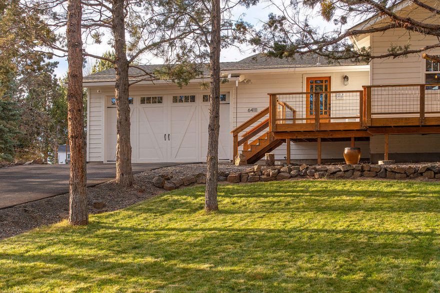 Welcome to this stunning modern farmhouse located in the highly desirable Tumalo Rim neighborhood. The private placement of the home nestled behind old growth Juniper trees is one of the many perks. Enjoy the elbow room in a country setting on this 1.08-acre lot that backs to a 5-acre common area. The vast remodeling throughout sets the home apart in this mature neighborhood. This home can accommodate your loved ones with 2 master suites, 1 on the main level. Take your pick where you relax including 4 comfy bedrooms or escape to the bonus office space for work. There is room to keep all your gadgets & toys secured in the detached 24x30, 200 AMP service shop. Keep your vehicles parked in the attached 2 car garage. The recently updated spa like master bathroom is exceptionally functional. Wide-open concept kitchen, dining & living room create a nice gathering space. Catch the sunrise on the front porch & end the day unwinding with a warm fire next to a beautiful pond & watch the sunset.