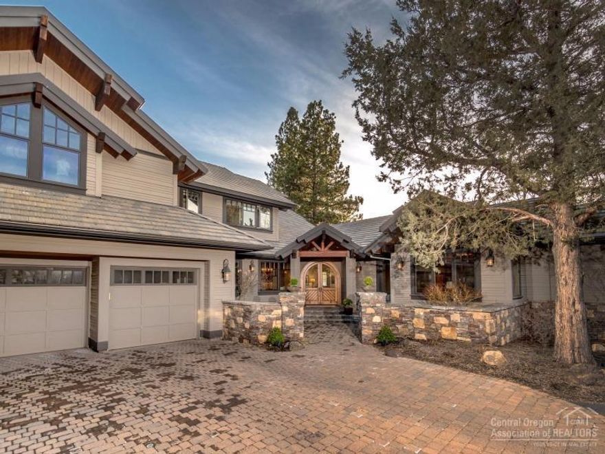 Beautiful custom home located on the 6th green/7th tee box in Broken Top. Remodeled kitchen, reclaimed Italian tile & Brazilian walnut wide plank floors, knotty alder cabinetry, full in floor heating systems, rock fireplaces, lots of built-ins. Each bedroom has its own bathroom, large bonus room with full wet bar. Recent outdoor living space added with a fireplace, built-in bbq and a privacy wall. The home is south west facing for lots of winter sunshine and beautiful vistas.