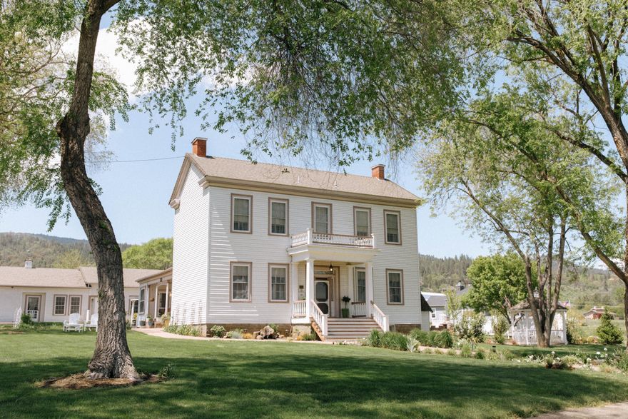 Own a piece of Jacksonville History & prepare to fall in love with this beautiful ''Romantic Estate''. Whether one wants to operate an AirB&B, wedding venue, multi-family living, or simply have room to breathe, this idyllic setting offers endless possibilities. This Rogue Valley jewel offers ornamentation & distinctive decor, designer decorated bdrms. 6 fireplaces, butler's pantry, jetted & clawfoot tubs, library & parlor. Kitchen features Vulcan range/oven, subzero fridge, prep kitchen & more. Over 2 acres lushly landscaped, BBQ nook & koi pond. Multiple outdoor seating areas. Detached carriage house offers it's own gourmet kitchen: Viking range/oven, subzero fridge, island w/prep sink & pantry. Located just minutes from Jacksonville. Elegant furnishings in the Estate home are included for a turn-key sale. Commercial & domestic septic systems, 2 operating wells (one artesian) + two holding tanks. Detached 4+ car garage, gazabo, and complete this package.