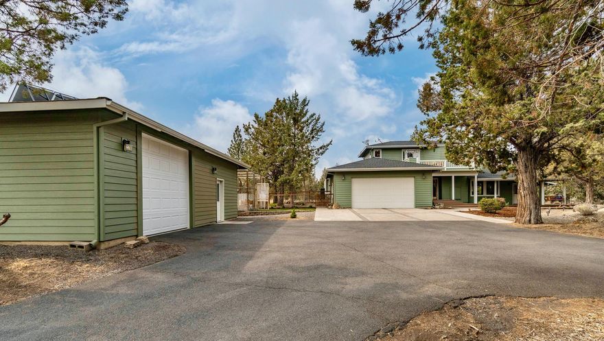 A private oasis on 10.37 acres, nestled in the Juniper and Pine trees just minutes from downtown Bend and Tumalo State Park. This well designed home features an open floor plan while still offering separation of space, a wrap around porch giving access to the patio, fire pit, and a hammock area. Open beams in the great room, custom copper work, and metal hand railings are just a few of the touches that make this house an exceptional place to call home. The detached garage/shop is complete with a 9'8'' door, solar radiant heat, and a separate office. Plenty of space to accommodate your toys, work, and hobbies. Gardeners will be overjoyed with the fully enclosed gardening area knowing that your plants are protected from animals while getting plenty of sunshine. If your cats need some safe outdoor time, it's the perfect spot for a luxurious Catio. Don't miss the dog run with access attached to the garage. Enjoy the peace and quiet that Central Oregon has to offer from this serene property.