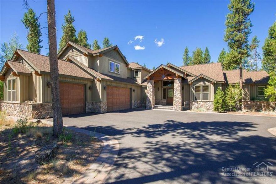 Can you say Luxury and Fun! Welcome to Sunstone Lodge in Caldera Springs. This custom build home is amazing inside and out. Entertainment areas for all. Chef's kitchen inside and out. Outdoor kitchen has gas BBQ, a beverage center and a built in TV, music system and heater. The covered outside paver patio area has gas fireplace, 42 TV and audio system. Large timbered great room. 2 master suites on the main floor (home sleeps 16). Upstairs is a bonus room/game room built for fun. Come Enjoy!