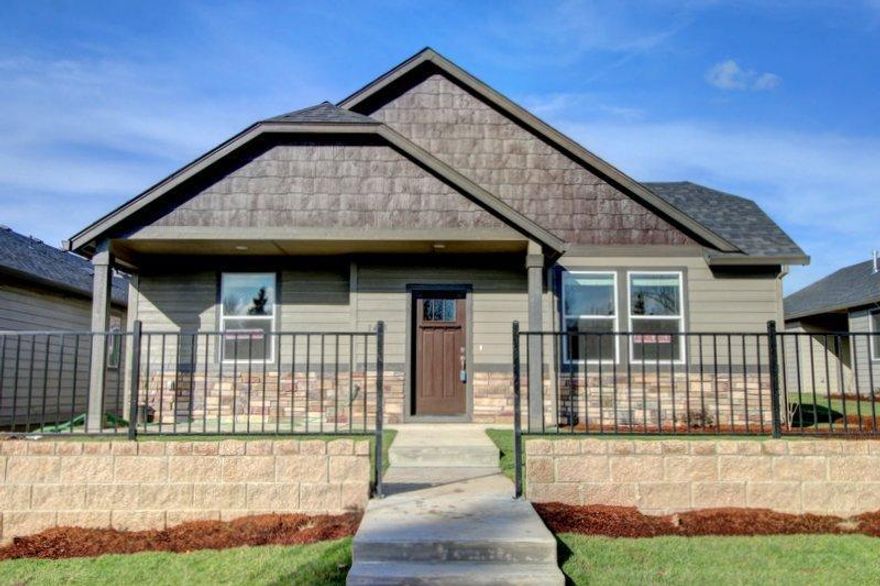 Enjoy the open floor plan of our 'Targhee' plan, featuring a main floor master and two bedrooms, a living room with gas fireplace, a kitchen with quartz countertops and SS appliances and engineered hardwood floors in the kitchen and dining area. Upstairs enjoy the 4th bedroom and bath with it's own family room. The alley accessed 3-car garage creates great street appeal. Front and side yard landscaping included. Pictures are for representative purpose only.