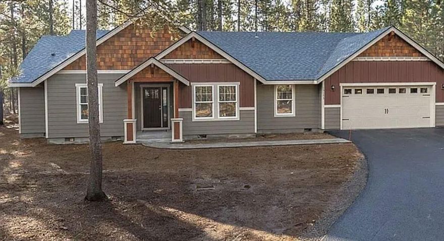 Located in the fabulous Ponderosa Pines neighborhood, this home backs up to over 12,000 acres of forest with great walking and biking trails; and just minutes from the Upper Deschutes River. This is a single level spacious home with 4 bedrooms 2 baths, vaulted ceiling, and an open great room floor plan. The kitchen consists of engineered bamboo hardwood floors, farmhouse sink, granite counters and opens to a 14' x14' covered back patio. Featuring an oversized 2 car garage with shop area which includes a dedicated 220 volt welding outlet - great for a home gym; home office or shop. RV parking pad. Additional 200 amp service for future use. A 20' X 20' shed big enough for all your tools and extra storage with an attached cover. This home features a hot tub paver pad - ready for your hot tub and a large custom play structure perfect for the kids or grandkids. Spacious 1.28 acre lot provides added privacy and plenty of room for an additional shop. HOA fee includes your water usage.
