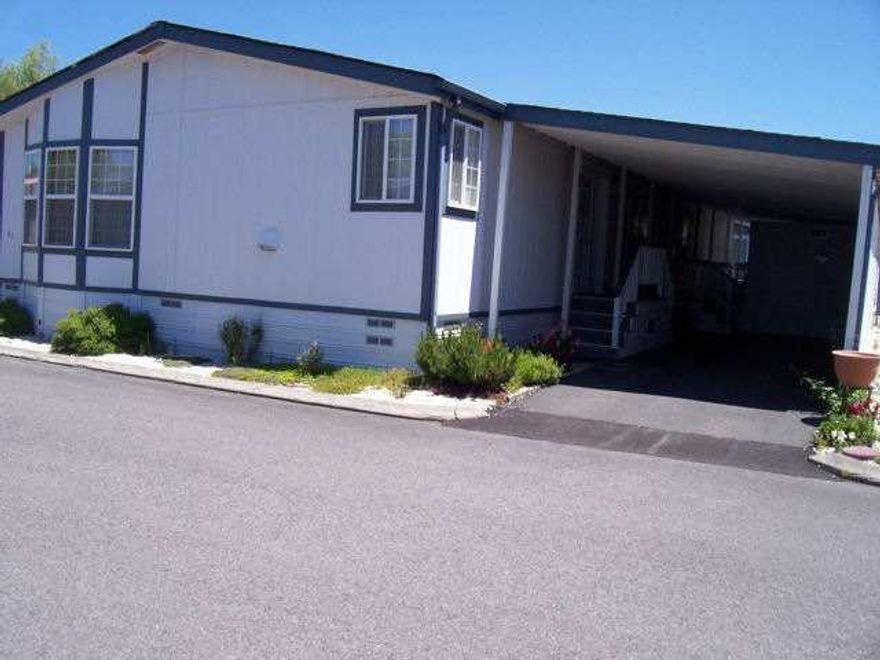 Park Fee $305 Per Month Includes Water, Sewer, And Garbage. Must Be Approved With Park. Beautiful Upgraded Home. Must See! Corner Gas Fireplace. Upgraded Kitchen. Large Covered Carport, Nice Protected Deck, And Many Other Great Amenities.