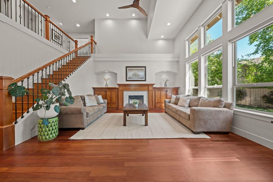 Stunning details set this newly updated, River Rim home apart. An abundance of natural light illuminates the spacious great room with dramatic 2-story ceilings, new hardwood floors & gas fireplace. A chef's kitchen designed with Italian custom copper hood, Bluestar commercial gas cooktop, imported Brazilian Quartzite counters & full height back splash, walk-in pantry, under cabinet lighting, large island with seating for 5. Main level also includes an office or bedroom #5, updated powder bath & laundry room. Impressive elements continue in the upper level primary suite & new, luxurious bathroom with Quartzite counters, heated Italian tile floors, double vanity, full tile walk-in shower, free-standing tub, 2 walk-in closets & vaulted ceilings. Also there's 3 upper level guest bedrooms, full bathroom & adjacent office.  Ideal location, walk to Deschutes River Trail, parks & 10 minute drive to Old Mill district. New kitchen, bathrooms, interior & exterior paint/stain in '23 & roof in '20