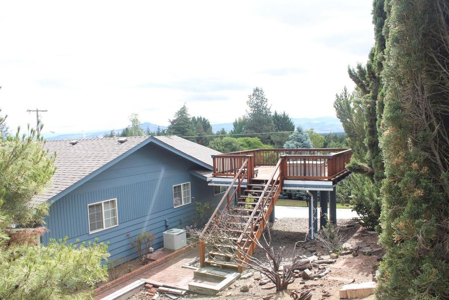 Incredible Jacksonville location with nice views. Very functional floor plan with living room and family room. Home is well built with nice features. Large deck that looks over the Rogue Valley. RV parking and dead end street make this a great place to call home. Hardwood floors under the carpet in living room and bedroom.