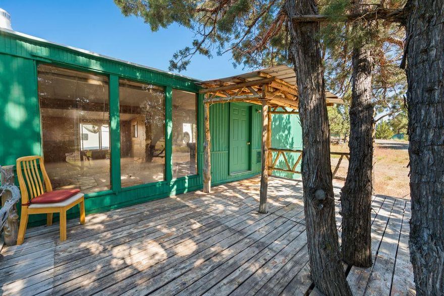 Seller may be willing to carry contract! Own a rare 22.96 ac mountain compound near 850 ac of BLM land & 3000 ac of forestry land - ideal for mountain biking, ATV riding, hunting, archery, shooting, & more! This off grid retreat has room for everyone, w/  bunkhouse, 5th wheel, & manufactured home, heavy-duty solar system, 5 cisterns, 2 generators, propane tank, & multiple sheds/workshops. Property is wildlife- rich, w/ stunning panoramic views of the Ochocos & valley below. Whether its stargazing, hiking, biking or camping, outdoor adventures are endless. Land is flat, buildable, & offers incredible potential for future development or custom homestead. Not far from Prineville Res., this private oasis is perfect for nature lovers & those seeking solitude. Have peace of mind to create your dream retreat! Property offers potential for rebuilding or replacing the residence ( buyer must do own due diligence). Don't miss your chance, larger, buildable parcels like this are rare!