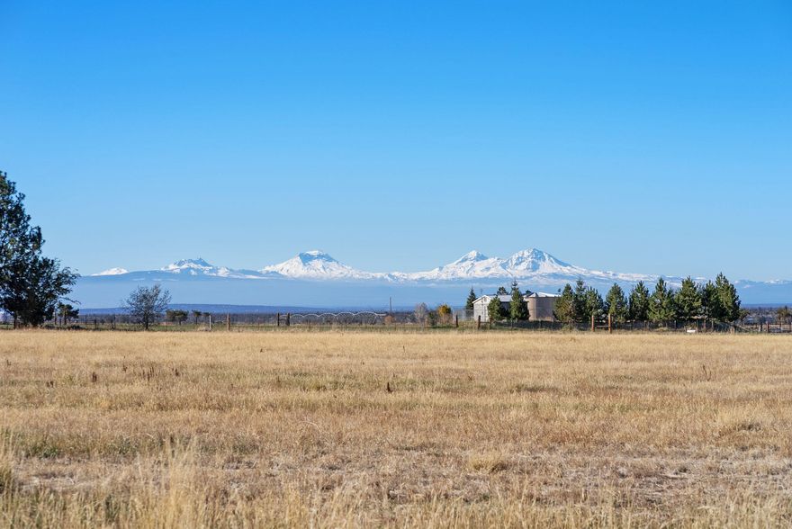 Large acreage in the high desert of Powell Butte. 116 acres with 22 acres of COID irrigation rights. Large shop. Single level home in a dreamy setting with future opportunity to place your fingerprint on this property.