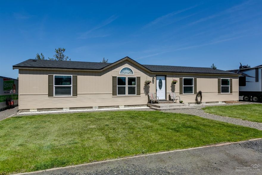 Enjoy this 1728 sq ft home and all it offers on its 2.34 acres. The home has an updated master suite with walk-in closet, separate from additional 3 spacious bedrooms and second updated bath. As well as a bright, open living, dining and kitchen space. Multiple updates include new roof in 2017, fresh interior/exterior paint and new flooring throughout kitchen, utility room and entry. Property features large sturdy shop, multiple outbuildings, and an extra large kennel for your pets. Circle drive, parking space with fresh gravel, and many extras.