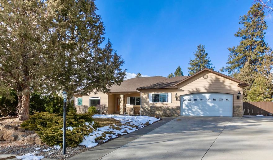 Don't miss this Private Oasis in the heart of Bend. Over 1/3 ac fully fenced and cul-de-sac location with extra parking for toys, room for gardens & plenty of grass backing up to the canal. This IMMACULATE single-level ranch home has been well cared for over the years with one owner. Home features both living room & family room areas. Also formal dining room in addition to breakfast bar with space for a second table. Three large bedrooms with separation from the master suite. And last but not least an office/studio/classroom flex space! Your pick! Plenty of built-in storage and cabinets, gas fireplace, AC, large private covered deck all on ONE LEVEL in highly desirable established neighborhood. Property line goes to middle of canal.