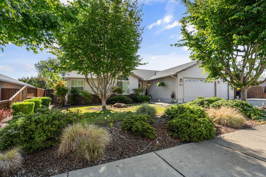 Welcome to 2025 Colorado Ln - a charming Southern Oregon home in a desirable Grants Pass neighborhood! This 1,684 sq ft residence features an open floor plan with vaulted ceilings that create a light and spacious feel. Offering 3 bedrooms and 2 bathrooms, including a comfortable primary suite, this home is ideal for both relaxing and entertaining. Enjoy newer appliances in the kitchen, a two-car garage for ample storage, and a wonderful backyard setting with a covered patio perfect for year-round enjoyment. Located close to schools, parks, and all the conveniences of town—this home has it all!