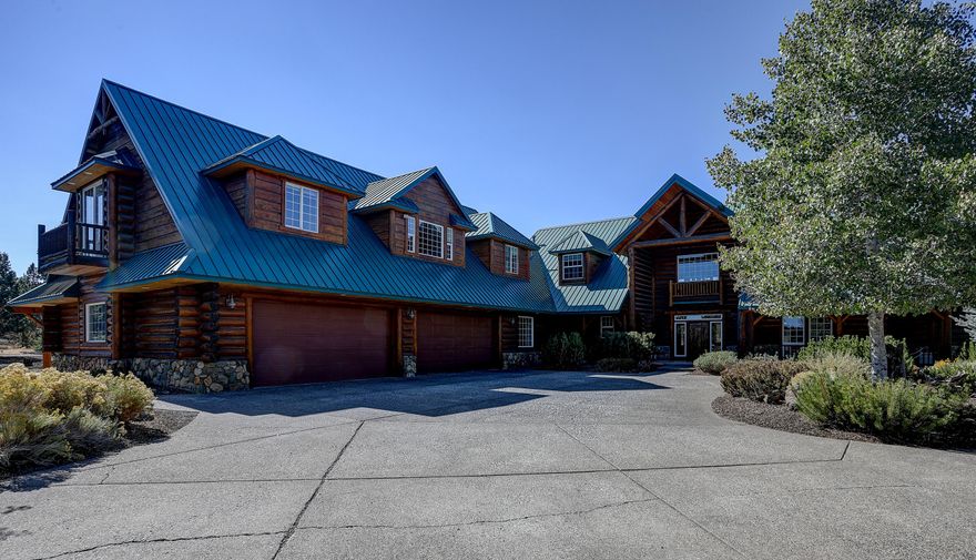 For sale is this absolutely stunning, spacious lodge style home in the wonderful city of Bend. Some of the features this home has to offer include 2 master bedrooms, an office, a workshop, and a guest house! This home is amazing and speaks for itself. Enjoy the gorgeous mountain views from this nearly 40 acre property. Take some time to look at the photos and details and give us a call today! A virtual tour is also available for your convenience.