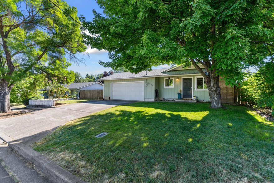 Beautiful East Medford Gem! This 3 Bedroom 2 Bathroom home has over 1,230 sqft and sits on a .18 acre lot. Newer LVP Flooring throughout the entire home with Carpet in the Bedrooms and Tile in the Bathrooms. Gorgeous corner Fireplace insert with floor to ceiling brick create a one of a kind accent piece. The oversized Backyard is fully fenced with a small patio, Slate Stone Fire Pit and storage shed that has power. New Roof installed in 2020 along with a Brand New Water Heater, Furnace and HVAC system installed in 2023. All while being centrally located 1 mile from Restaurants, Shopping, Parks and Entertainment. Call to schedule your private tour!!