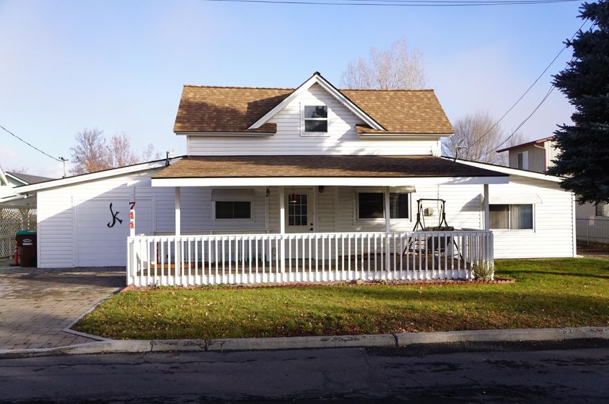 Great layout to work/school from home. This is a nice older home that has an updated kitchen, newer gas stove in living room, large open concept kitchen/dining/living area, the two bedrooms upstairs are partly remodeled, has large bonus room, one car garage with large shop, parking both in front & back of home, large covered deck in front, covered deck in back, a well and underground sprinklers for irrigation, on a double lot for extra space, new roof in 2020. Owner is a licensed Oregon Real Estate agent.