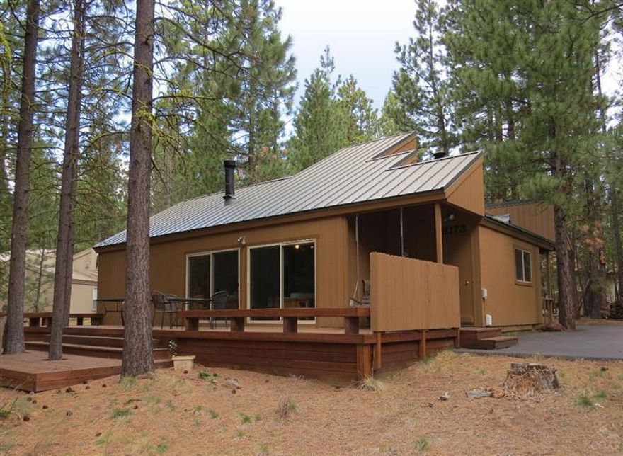 This fine 3 bedroom, 2 bath home is priced competitively. Shop and compare. Good location in the Golf Home section. Nice wood floors, a wood burning stove, nice furnishings, and a big deck are just some of the features in this home. In addition to the 3 bedrooms, there is a sleeping loft for more room.