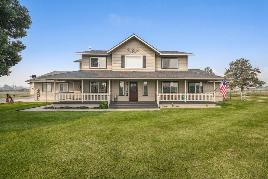 Your forever home in the desirable Equestrian Meadows in N Redmond is ready for your next move! With Cascade mountains and Smith Rock views, this perfect place is complete with a substantial, gorgeous dream farmhouse, six acres of property with 3.9 mapped irrig. water rights, pond, large shop, RV hookup, and plenty of space for your outdoor equipment. Covered front and back porches create cozy spots to soak in the panoramic views, while a fun, covered patio area will welcome your guests for fabulous dinner parties. The open floor plan, vaulted ceilings, french doors, expansive kitchen island, bright den space, and two primary suites offer plenty of space for all of your entertainment needs. Don't miss the rare opportunity to own in this special Redmond neighborhood!