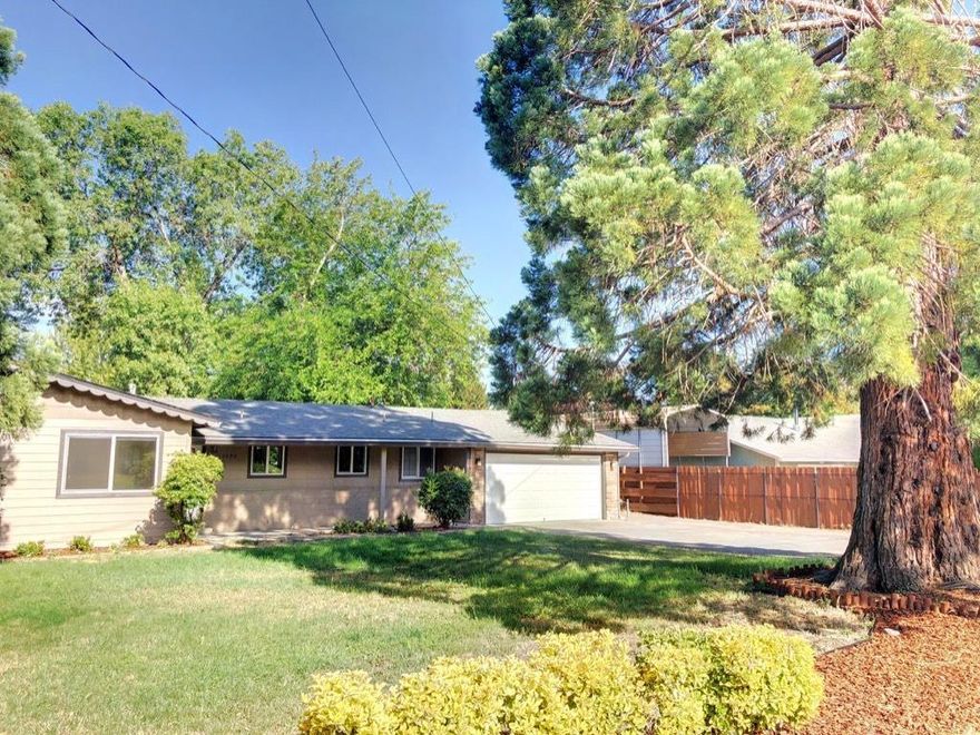 This newly remodeled 3 bdrm, 2.5 bath is a must see! Entirely upgraded with quality designs, beautiful wood floors throughout, fully tiled bathrooms and kitchen, upgraded stainless steel appliances, granite countertops and much more! The master bathroom sports a beautiful walk-in pebble floor shower. You'll also enjoy views of the spacious backyard from the strategically placed windows and french doors that open from the open kitchen/living area. Located in the Harbeck area of Grants Pass in a quiet neighborhood yet minutes from the hospital and all conveniences of town. This large lot has irrigation rights.