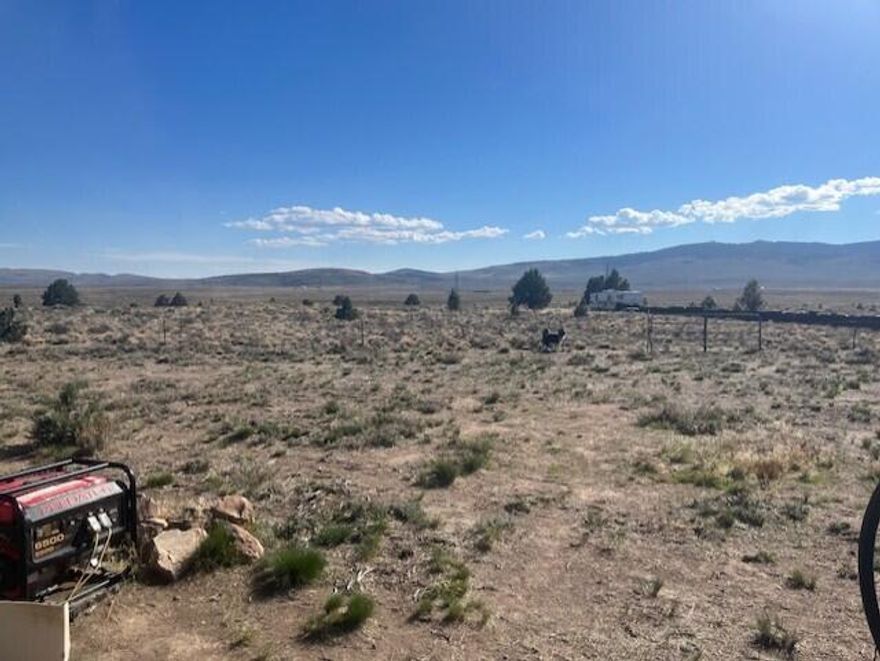 Welcome to your off-grid escape - 20 acres of Partially fenced & cross-fenced land offering privacy, functionality, & endless adventure. This unique property borders public land on one side, w/ nearby access to thousands of acres w/ OHV trails, perfect for exploring Central Oregon's rugged terrain. Included are a 30' fifth wheel trailer, U-Haul water system w/ two large water storage tanks, an outhouse, & solar power setup w/batteries to support sustainable living. Multiple storage/salvage facilities provide ample space for tools, equipment, or recreational gear. Located just 30 miles from both Prineville & Bend, close to Bend Trap Club, this property is ideally situated for those who value solitude without sacrificing access to community & amenities. Whether you're seeking a weekend retreat, a basecamp for outdoor exploration, or a full-time off-grid lifestyle, this property also offers great views. Sold ''AS IS''. Ready for your vision.