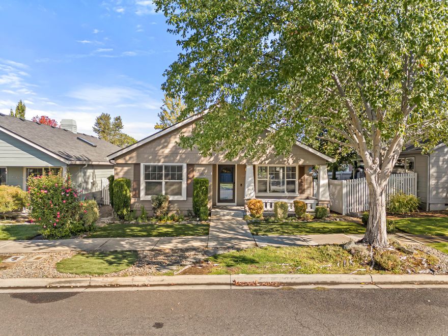 Modern 3BD/2BA Craftsman located in a lovely neighborhood near Rogue Regional Medical Center, restaurants, golf courses, shopping, and great schools. New roof & exterior paint within the last few years! Darling covered front porch. Perfectly-sized 1575 sq.ft. floor plan w/separate hallways for master suite & guest wing. Roomy master bedroom w/custom shutters & walk-in closet. Master bathroom features large skylight and step-in shower. Bright guest bathroom w/shower-tub combo. Gorgeous continuous oak hardwood floors through the common areas. Inviting front living room w/vaulted ceiling, corner gas fireplace and built-in display nooks. Tasteful and accessible kitchen w/contrasting color scheme, over-the-sink windows, extensive cabinetry, and well-placed stainless steel appliances. Cheerful paver back patio, fenced and private due to its location at the end of the alley. Yards designed for low-maintenance living. Well-kept neighborhood w/no HOA!