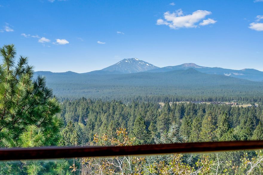 Outstanding Westside location! Impressive contemporary situated on a quiet cul-de-sac atop SW Bend's Golden Butte w/show stopping views of snow-capped Cascade Mountains and southern terrain from the covered view deck, as well as eastern and northern buttes. True Greatroom plan w/open kitchen & raised eating bar, large dining & living areas surrounded by captivating view windows that punctuate the Westside view experience. The Primary Suite off the Greatroom offers deck access to a flat fenced back yard. Entry area office across from the cozy gathering room w/fireplace & wet bar. A large media room is perfect for watching movies. Two additional bedrooms & full bath also on the entry level. Central vac, indoor/outdoor speakers & energy efficient solar panels. Triple car garage. Huge finished storage off the media room. Backs to Overturf Butte open space & trails, all just minutes from Bend's top-rated schools, dynamic downtown with its celebrated shops & eateries and Northwest Crossing.