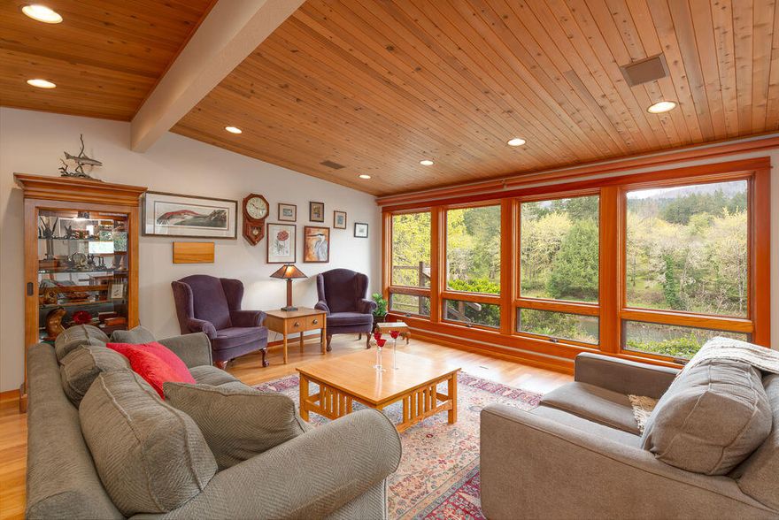 This single-level 2-bedroom, 2.5-bathroom home with a full walkout basement offers an exceptional opportunity to own a riverside retreat on the North Umpqua River. Boasting hardwood floors and hand-crafted custom wood cabinetry throughout, this home exudes luxury and craftsmanship.The gourmet kitchen is a chef's dream, providing the perfect space to create culinary masterpieces. With direct access to the river, residents can enjoy fishing, kayaking, or simply relaxing on the deck while taking in the picturesque views. Wake up to breathtaking vistas of the river and surrounding forested hillsides, making every day feel like a vacation. Whether you're seeking a year-round residence, a vacation retreat, or an investment property, this home offers the ideal blend of luxury, comfort, and natural beauty. The property features an adjoining lot filled with perennial flowers, berries, and fruit trees, adding to its allure. Additionally, the sprinkler system and river water rights.