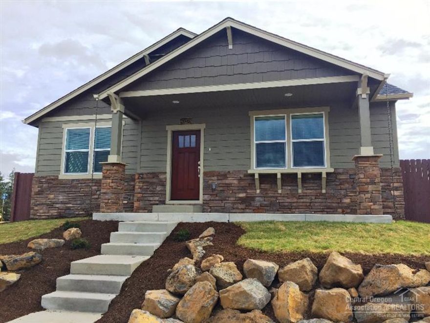 Single level on corner lot with three car garage. Features include: three car garage, masonry accents, A/C, Quartz countertops in kitchen, engineered hardwood in kitchen and dining, Maple cabinets, GE Cafe range, gas fireplace, tiled shower, full lap siding, gutters and enclosed soffits, insulated garage/door, and much more. Estimated completion: 8/3/15. Currently submitted for building permits to City of Bend.