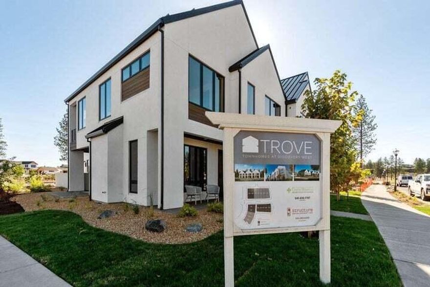 Introducing Trove Townhomes in fabulous Discovery West. This collaboration between COBA Award-winning builders Curtis Homes LLC and Structure Development brings two Scandinavian-inspired modern designs to Bend's desirable westside neighborhood. This Curtis Homes residence is 3127 sqft and features a
wonderful open great-room floor plan, 4 bedrooms and 3.5 baths, a gorgeous island kitchen with a stainless-steel appliance package, custom cabinets, a spacious upstairs loft, all tastefully finished by the designers at Curtis Homes in a way that compliments the clean Scandinavian esthetic. Located in close proximity to future Discovery Corner Plaza, a mix of storefronts, gathering spaces, and space for neighborhood events. It's also close to popular walking and biking trails. Trove offers carefree active living in this outstanding Discovery West location.