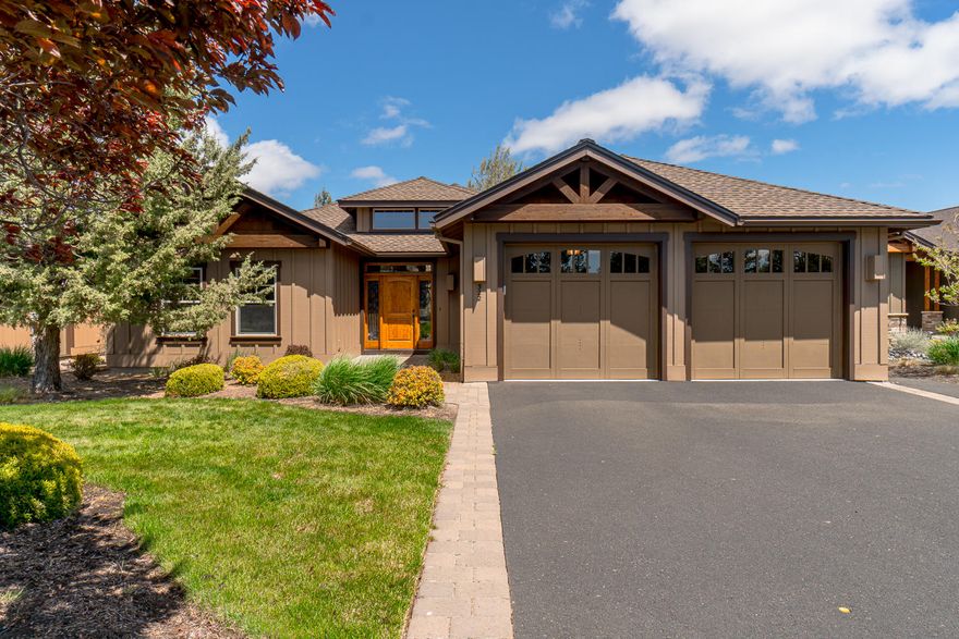 Gorgeous one level on the pond in Vista Rim! Great room floor plan features slate entry, solid maple hardwoods, built-in entertainment center, gas fireplace with stone fireplace surround, and built-in desk. Open-concept kitchen with slab granite counters, built-in pantry, large island with breakfast bar, gas range, and stainless appliances. Master suite with tray ceilings, gas fireplace, heated travertine floors, spacious walk-in closet, dual vanity, soaking tub, and walk-in shower. Two additional guest rooms, full bath, and half bath for guests. Large utility room with built-in pantry, utility sink, and cabinetry for extra storage. Expansive Trex deck overlooking community water feature and pond. Additional upgrades include knotty alder cabinets, trim and solid core doors, travertine floors in bathrooms, instant hot water, air flow exchange system, speakers throughout, and wired for TV/Stereo/Security System/Internet. New dishwasher, exterior paint, and 50-year roof.