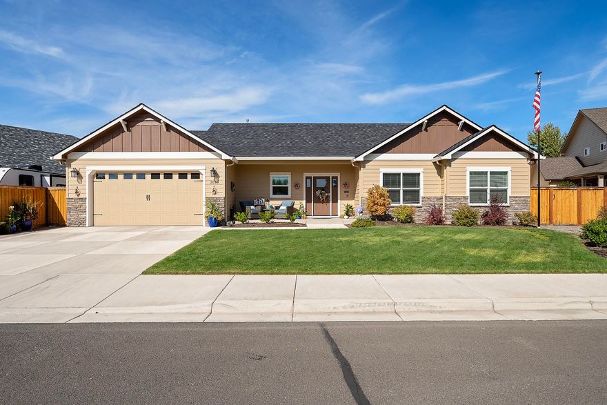 Discover this beautifully crafted 4-bedroom, 2-bath Horton Home located in Central Point. The open floor plan is highlighted by coffered ceilings, gas fireplace and engineered hardwood floors creating an inviting atmosphere. High end appliances, granite countertops, oversize island that invites the living room into the kitchen for entertaining. The primary suite is a true retreat, boasting luxurious tile, glass shower and walk in closet. The backyard features a covered back porch, built in wood burning fire pit, swim spa and gazebo. Ample RV parking and 50 Year architectural roof. Schedule your showing today!