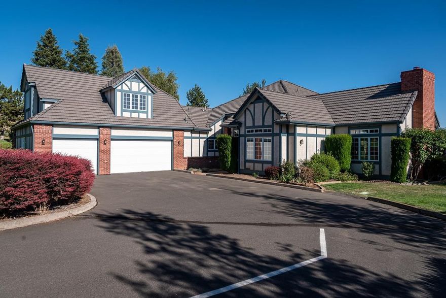 Beautiful custom one-owner home in desirable Shield Crest. Classic French Provincial style situated on a full acre with expansive views south over the Klamath Basin to be enjoyed particularly from the back deck. Stately entry with large great room and brick fireplace. The master bedroom is located on the main level along with a den plus an additional three bedrooms upstairs. Custom walnut cabinetry handcrafted by Borror's Cabinets plus double ovens in the kitchen. Built-in walnut cabinets and built-in roll-up desk in the office/den. Extra deep 3-car garage with an unfinished bonus room/storage area above the garage. Plenty of storage throughout. New Trane furnace, A/C, and water purification system. New well pump, new sprinkler valves and Rainbird irrigation valves, heads, & irrigation box in 2018. New hot water heater in 2017.