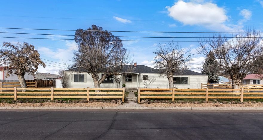 Located in the desirable original area of Ochoco Heights, you'll find this charming home on a corner lot. While the home boasts several updates and upgrades, including a new roof, some flooring, cabinets, and fixtures, the attractive vintage features remain. The rooms are cozy while spacious, light and bright, with plenty of living space for you and your guests! You'll love the open shelves and butcher block countertops in the updated kitchen, the perfectly placed laundry and powder room, and the private primary suite/office & den area that can remain closed off from the living space of the house. This property lies in a well-established Prineville development, has alley access, a large driveway for parking, and a fenced backyard with covered patio area. Don't miss this one!