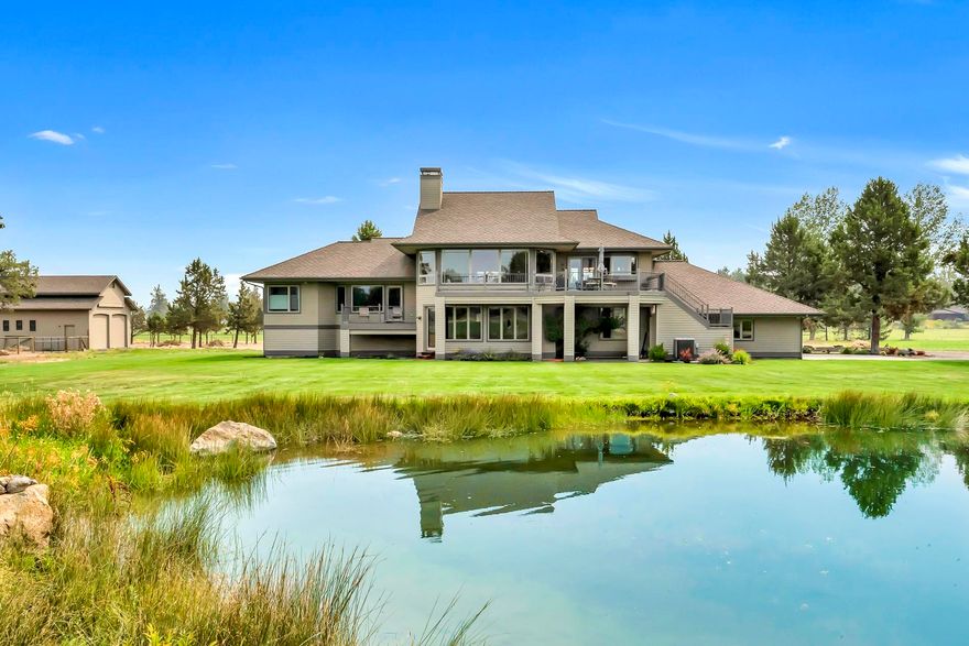 Panoramic mountain views, 8 peaks if you're counting and they can all be seen from most every room within this home. Custom designed and well built, this 3,127 SqFt house sits on 19.72 total acres, 16 of which are green with irrigation. The upper level features a great room, kitchen and large dining area that all have access to the newly refinished decks. The kitchen was designed for a chef, featuring a 48'' viking range, two sinks, a walk in pantry, an island and a breakfast bar. A private master wing with large picture windows, a spacious bath, tiled shower and a soaking tub. A three car attached garage and an additional detached shop with power and water that easily could be converted to a barn. All this and only 1.8 miles to the Deschutes river and the shops and restaurants in the little town of Tumalo.