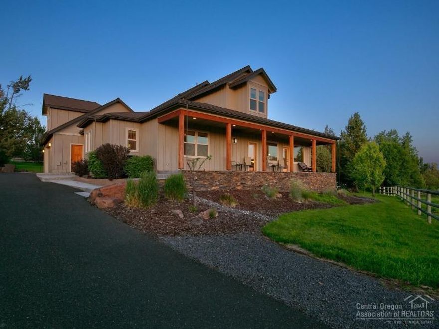 Custom home on 4.74 acres with 3.6 acres of irrigation and green pastures. Main Level Living Home is 2897 sf 3 bed, 2.5 bath, open floor plan, kitchen with Silestone counters, pantry, office, master suite, bonus room, attached 3 car garage, deck and covered porch. Beautiful setting with landscaped yard, sprinkler system and pond. Property: Shop with concrete floors, office space, garden area, paved driveway and is fenced. Cascade Mountain Views located between Redmond and Terrebonne.