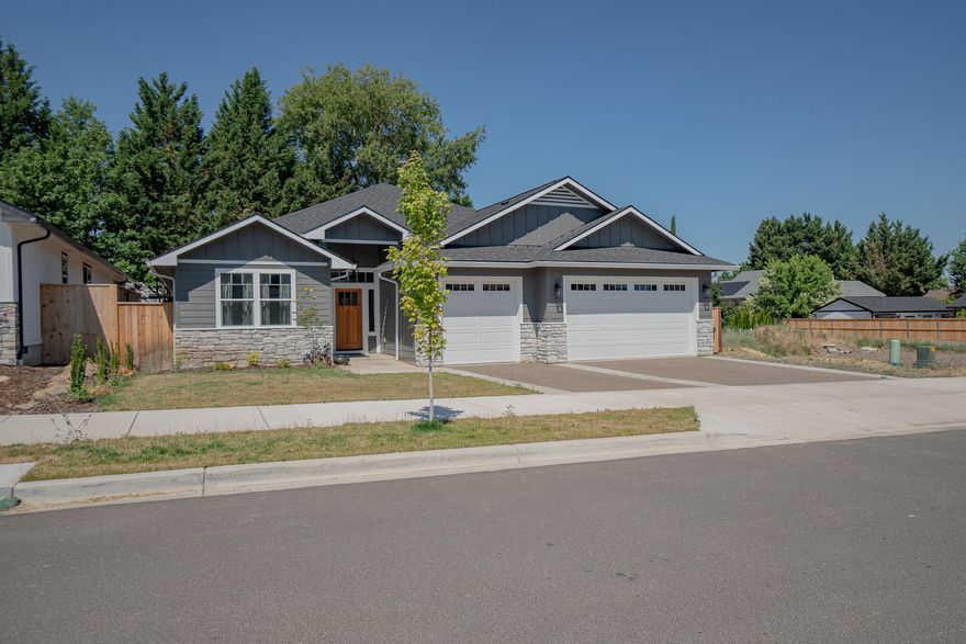 Exquisite Recently Finished 2022 residence constructed with Pride by Mitts Custom Homes.  This 4 Bed/2 Bath home is in the highly desirable East Medford High Cedars at Cedar Landing subdivision. Level Design3-Car garage (new insulation in garage attic) with an abundance of Upgrades & Additional Features! Impressive entrance, spacious open layout, stunning upgraded vinyl plank flooring, tile floors in the laundry room and bathrooms, coffered ceilings in the living room and primary bedroom, gas fireplace with custom built-in cabinets, upgraded lighting and plumbing fixtures throughout, and much more. The sizable and beautiful kitchen boasts granite countertops, an island with an under-mounted farmhouse sink, custom soft-close cabinets, an oversized pantry, and upgraded stainless steel appliances. The primary suite is truly remarkable, featuring a double vanity, custom walk-in shower, deep soaking tub, walk-in closet, and wrap-around built-in shelving. 220 volt outlet for car charging.