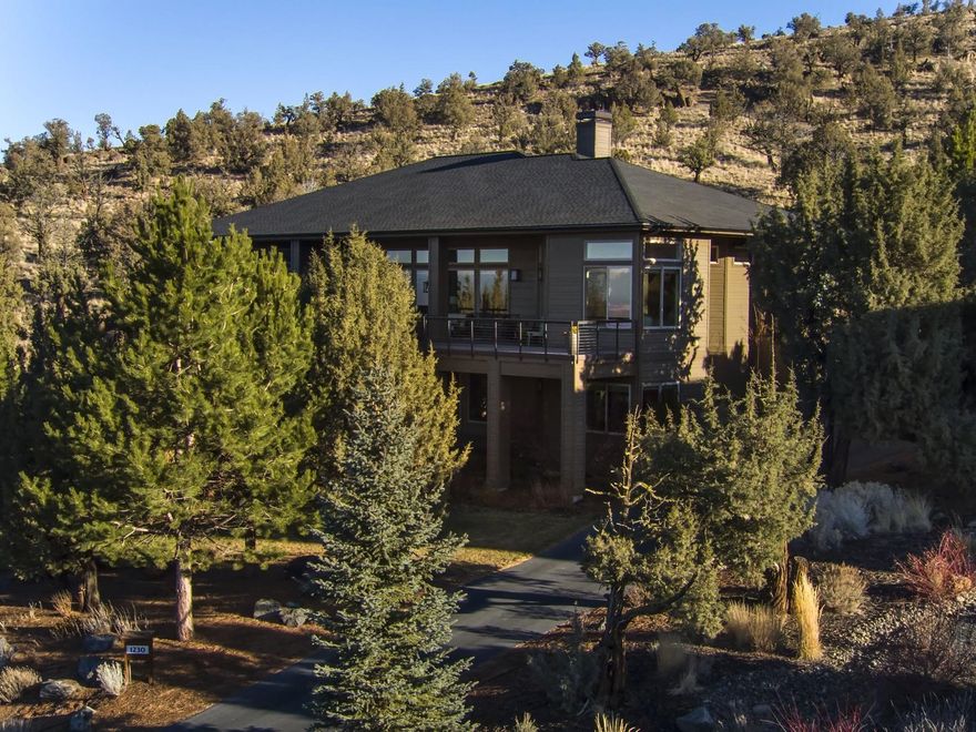 Stunning, unobstructed Cascade Mountain Views from Custom Home at the Ridge in Eaglecrest. Contemporary style home is 4250 sq ft, 4 bedrooms, 3.5 bathrooms, main floor living with open floor plan natural light and deck to enjoy outdoor living spaces. Chef's kitchen with granite countertops, stainless steel appliances, double ovens and breakfast nook. Formal dining room, office, living room with stone gas fireplace, Master Suite with walkin closet and soaking tub. Guest Suite on main level with beautiful tile shower. Downstairs includes family room, wet bar, two bedrooms and bathroom with access to patio and landscaped yard. Utility room, storage (under home) and 3 car garage with work space. Eaglecrest Amenities include: golf courses, pools, sports centers, spa, tennis courts hiking and biking trails.