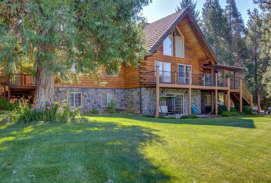 Highly desirable horse ready property in beautiful Southern Oregon! Built by renowned builders Homestead Log Homes, this stunning log home sits on 10.89 acres of usable flat land suitable for your horses to graze! There is a year round spring fed pond, exquisite sunset views from the wraparound deck, good producing fruit trees, 2 seasonal creeks, and even a solar powered chicken coop that opens and closes with the sunrise and sunset! The home offers lots of built in storage & appliances, vaulted ceilings, tons of light from the skylight and windows, lifetime warranted fireproof concrete shake roof, 2 water heaters, solar charged backup lighting and even a built in BBQ! There are so many rare features about this home that you must come see for yourself!