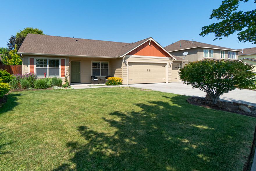 Located on the NW side of Redmond near Tom McCall/Elton Gregory sits this immaculate 4 bed, 2 bath single level home. Vaulted great room w/ an abundance of natural light, ceiling fans throughout, Hunter Douglas top down bottom up cellular blinds, wood wrapped windows, stone surround gas fp w/blower, hearth & mantle. Kitchen ftrs white cabinets, granite tile countertops, SS dishwasher, gas range, & plenty of cabinet space. Lg primary bedroom w/glass door to patio, bath w/dbl vanity, shower, walk in closet. 3 additional bedrooms share a full bath. Outside you'll find your own personal oasis w/large concrete patio w/pavers, LeBlanc Decks built the pergola, curved concrete paths, raised garden beds w/drip system, mature landscaping, fully fenced backyard, sprinkler system in front/rear, & double door shed stays! Triple garage, gas hot water heater + gas forced air with A/C. Easy access to HWY 97 and just a block to Quince Park - LOW Taxes too! Home is well maintained & move in ready.