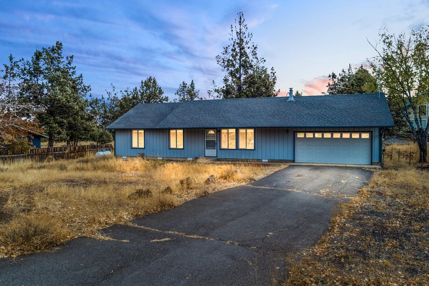 Single level home located on a large .32 of an acre lot.  3 bedrooms, 2 bathrooms, 1120 sq ft.  Home has had recent updates like interior and exterior paint as well as new roof in the last few years.  New carpet installed in the main living area and hallway.  Beautiful large back deck, perfect for entertaining.  Attached double car garage.  Forced air, central a/c. Located close to town.  Call your Realtor today for your personal tour!