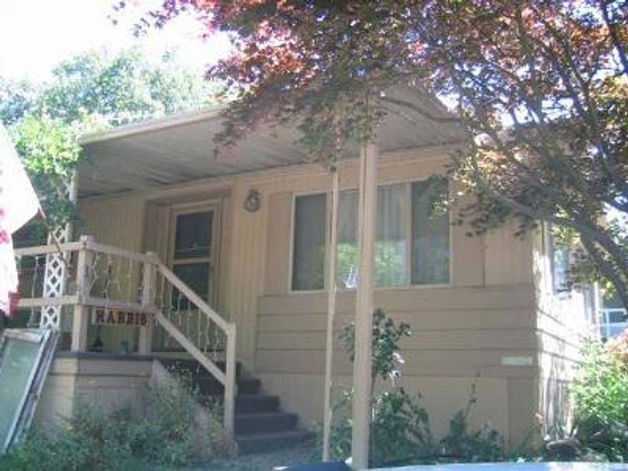 Bear Creek Park #39 for $41,000! Large MH with 1440 sq ft of privacy, space and Ashland living. Park setting surrounds this clean end unit with Greenway access. Lg master bed & bath. Shed/workshop, fenced yard, landscaped & carport! Nice country feel and easy on the pocketbook!