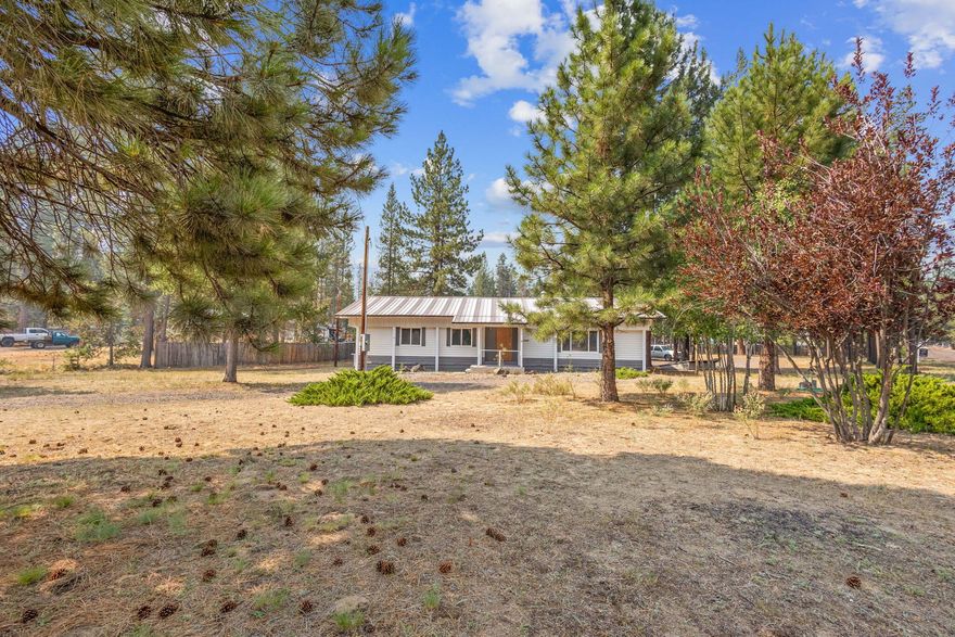 Newly remodeled farmhouse style home on almost an acre of land! Awesome opportunity to own a well-kept property in the heart of Central Oregon's recreation mecca!
Within 30 minutes of some of the best lakes, world class skiing, fishing, hiking, waterfalls, plus new restaurants, in one of the most affordable towns in CO. This 3
bedroom, 2 bath house has been remodeled w/new flooring, all new kitchen w/hickory cabinets, granite counters, open concept, and bonus room (4th bedroom?) as well as
3 heating sources: Woodstove, Oil monitor system, and forced air furnace. Property has lg 24x40 garage w/ new doors, work bench, attached workshop off back & (2) 30
amp RV plugs. (2) covered carports to park boats, trailers, cars, you name it. Storage shed, covered porch, and pump house. New well was installed in 2010. Nicely treed
lot, extremely cleaned, pull-thru driveway, and partially fenced. Paved roads all the way up to the last 100' or so.