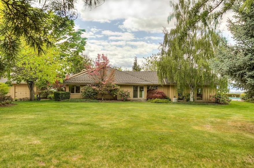 Exquisite horse property with the best views in the valley! Beautiful 3669 sq ft 4 bed 3.5 bath home on over 21 acres! Lovely formal living room with vaulted ceiling, fireplace & windows that look out to the tranquil Koi pond. Family room w/amazing built-ins. Dream kitchen with granite counters, 2 large islands, custom cabinetry & six burner stove. Master suite features view of the pool, glass counter, soaking tub & large tile shower. 3 guest bedrooms leave space for everyone. Spectacular in ground solar heated pool w/pergola is a wonderful place to relax and enjoy the views of the valley and rolling hills. Waterfall, large koi pond & tennis court truly make you feel like you are at a resort! Custom six stall barn with 12x12 stalls, large tack room, wash station/grooming area plus a convenient bath. New 90x180 sand arena w/pop up sprinklers for dust control. Additional barn with covered RV storage, and shop area. Paved driveway is gated for security and privacy.